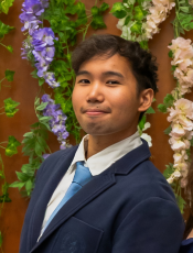 Headshot of Zachari M.